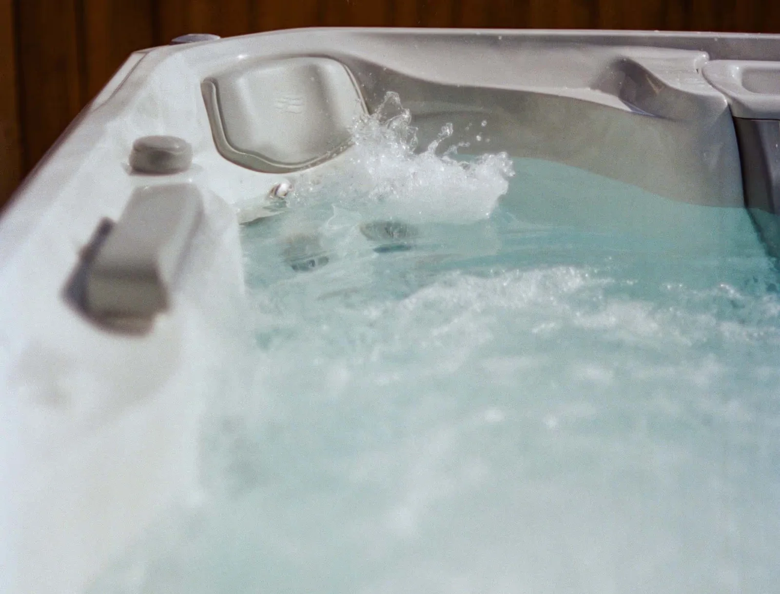 Warm water and massage jets flowing in a Sundance hot tub therapy seat